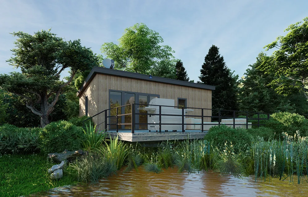 Modernes Ferienhaus mit Terrasse am Wasser, umgeben von Bäumen und Natur